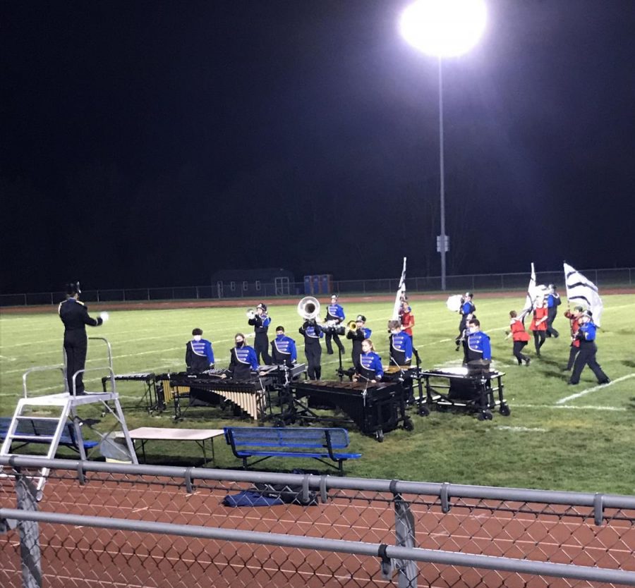 The+Golden+Regiment+Marching+Band+performing+in+competition+on+a+Monday+night