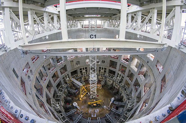 The interior of this building contains the tokamak of ITER, which is where the fusion reaction takes place.