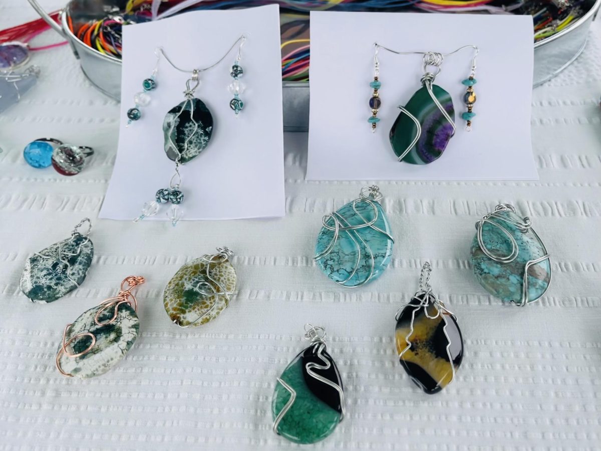 The farmers market also features handcrafted jewelry, like those from Land of Odds N Ends.