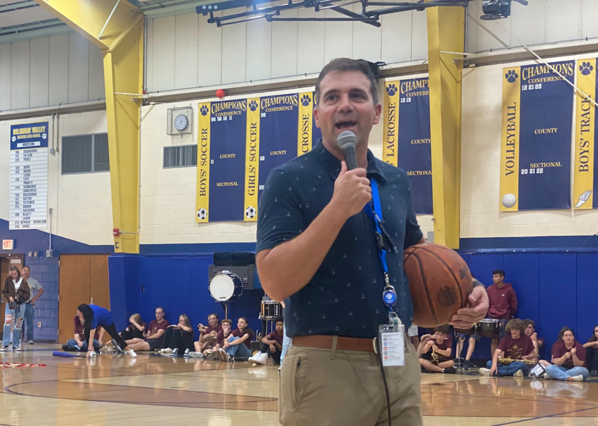 Principal Mr. Kays opened the event by rallying the pep rally crowd to support their teams before the relay races began.