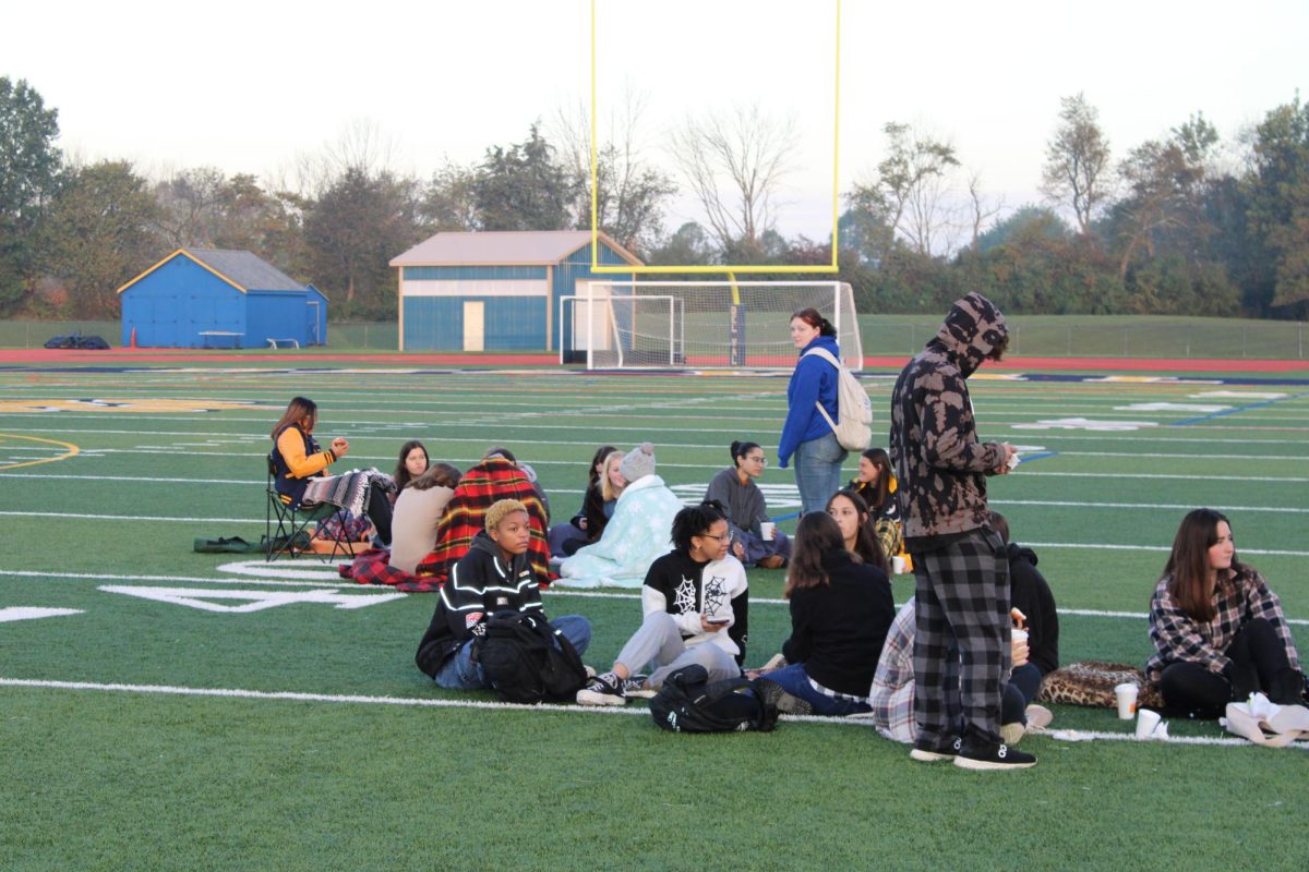 After students got their food, they brought chairs and blankets to sit with their piers. 