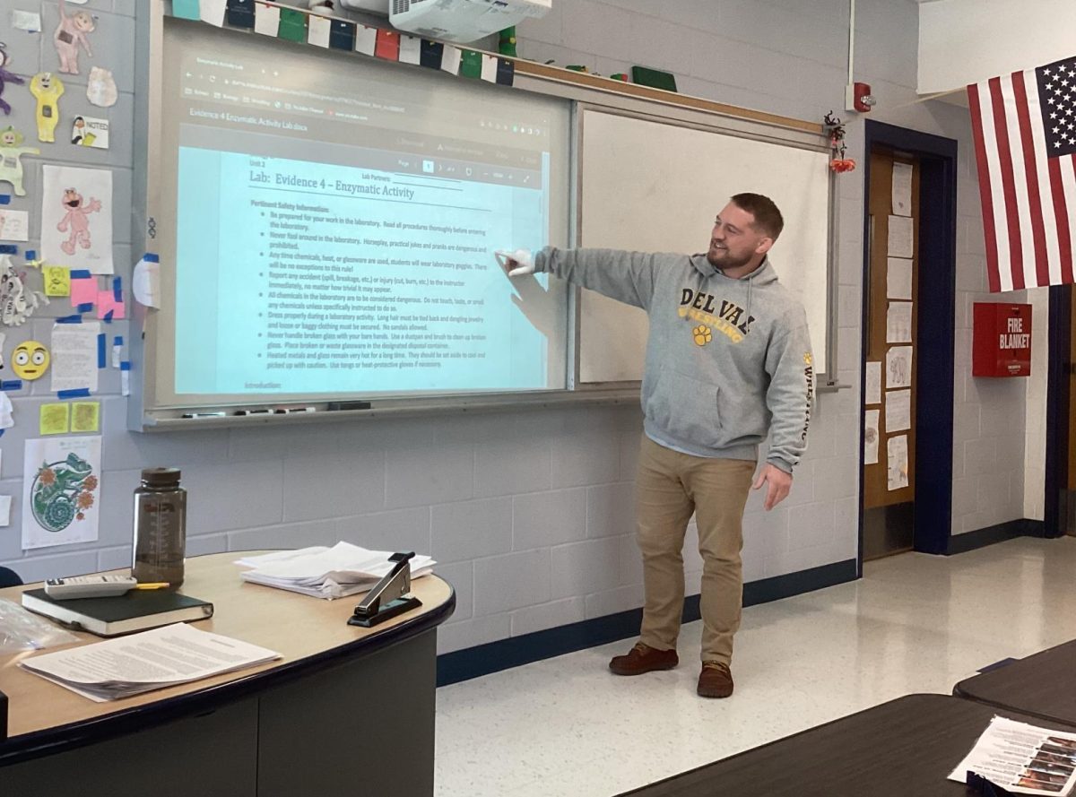 Biology teacher, Charles J. Inglin uses technology to effectively teach students about enzymes. 