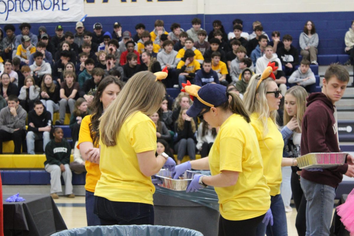 Certain teachers volunteered to help provide the contestants with more wings, if they were to run out. These teachers dressed as chickens and helped set up the wing bowl. 