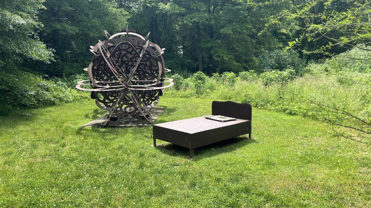 In The Meadow, there were randomly placed sculptures including this bed that caught the tour’s eyes as we walked passed. 