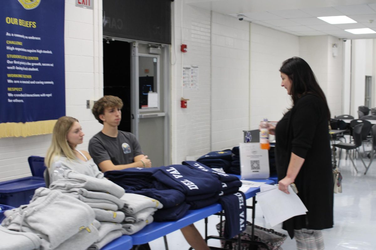 Members of Sport and Spirit selling Del Val merchandise to BTSN attendees.