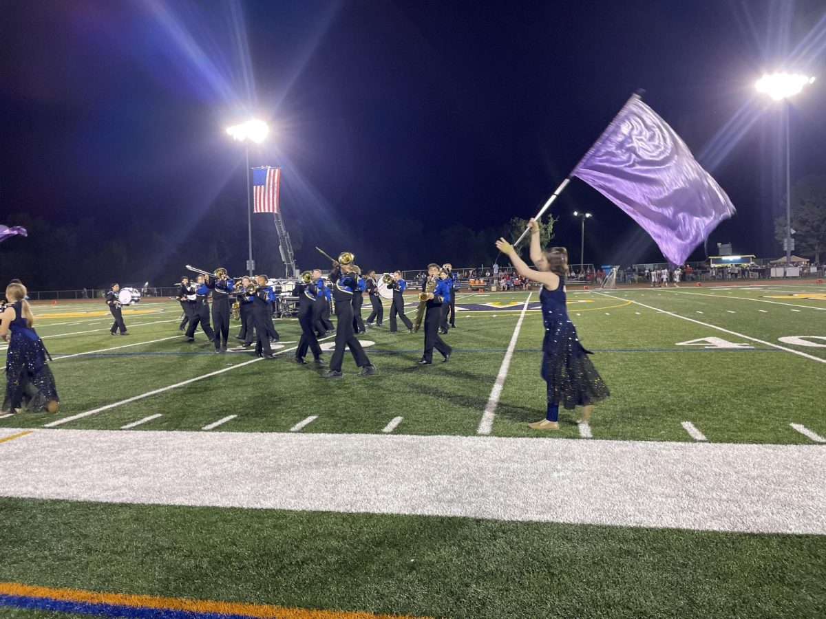 Del Val Marching Band performing during Half Time