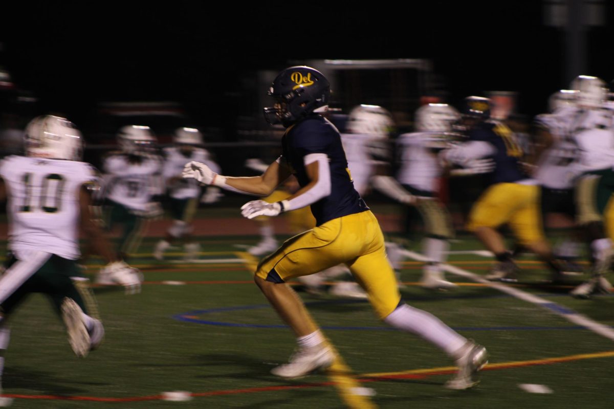 The football team versing J.P. Stevens at their last home game.