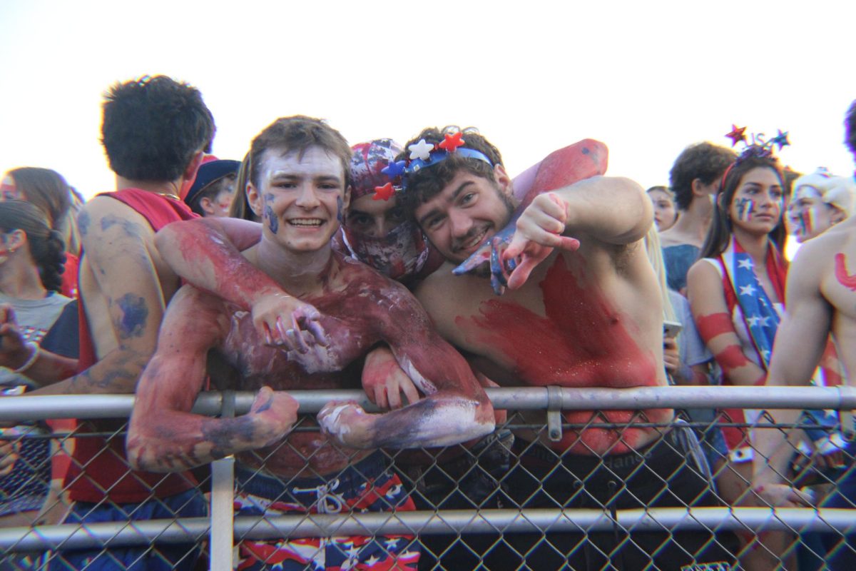 The student section, the Dawg Pound, was decked out in red, white and blue for the USA theme. Students join together patriotically in support of Del Val Football.