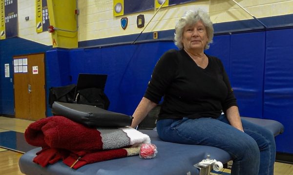 A local community member donating her blood to help others.