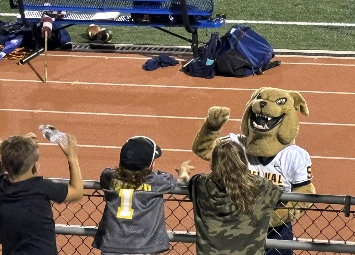 Tuffy the Terrier, Del Val’s mascot, riles up the crowd during crucial moments in the football game. His energy keeps the student section cheering.