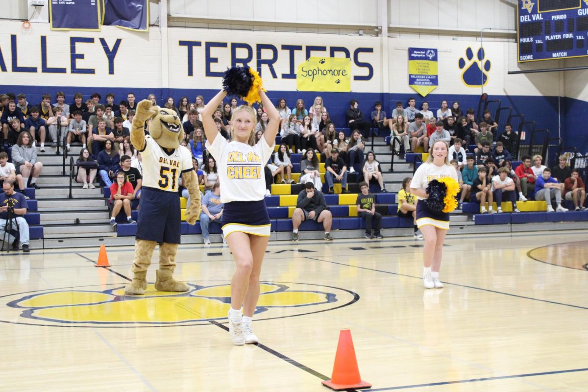 To excite the crowd, Del Val's cheerleading team put on a performance with Tuffy the Terrier. Tuffy, played by senior Ben Raider, is a staple at all football games.