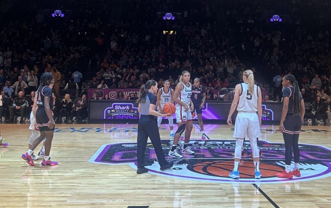 UConn and Louisville prepare for the jump off to start the game