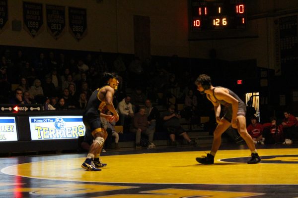 Del Val wrestlers faces off in their home opener.