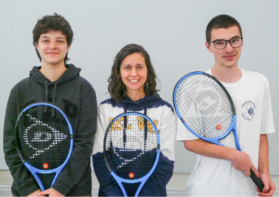 Mrs. Miceli stands between co-presidents Wyatt Mendolia on the right and Grayson Basile on the left. Ehraaz Tarique is the secretary (not pictured).