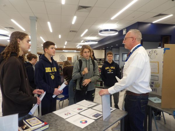 With the development of the new business program, teacher Joseph Perricone advertised the new features of his classroom and the benefits of his classes.