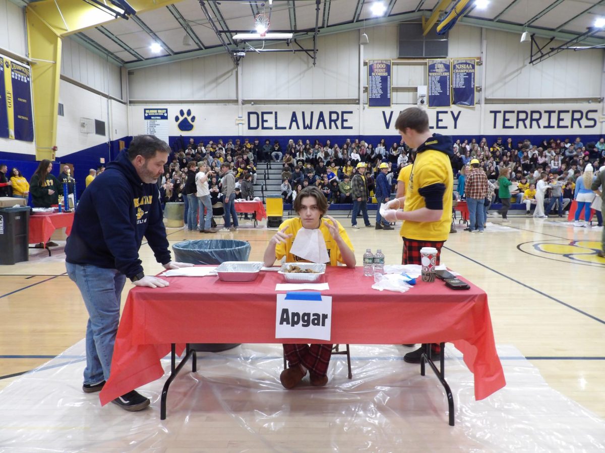 Junior Alex Apgar, 2024’s Wing Bowl winner, prepares to compete in the Wing Bowl.