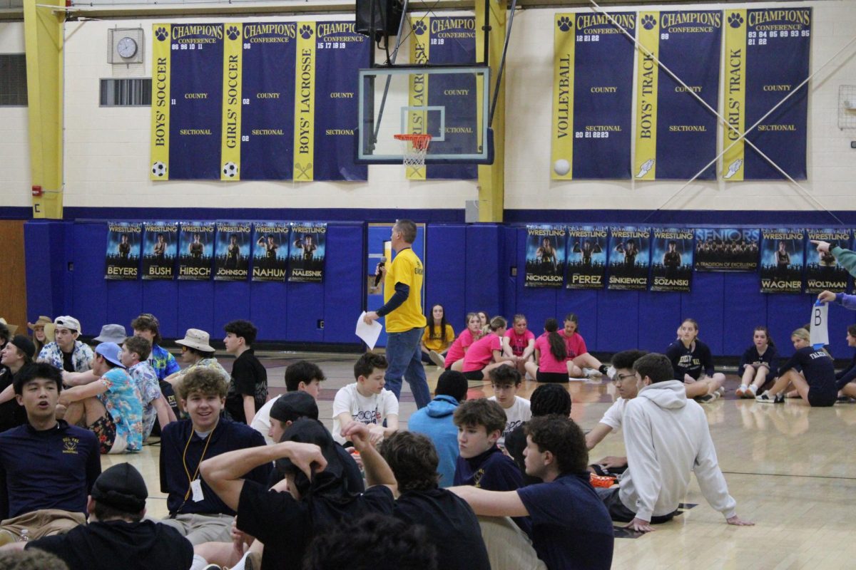 Mr. White, the organizer of the event, sat all the teams down and gave them a run down of the rules and reminded them what they're playing for. Hoops for Hunger is an annual event that fundraises for Hunterdon County food pantries. 