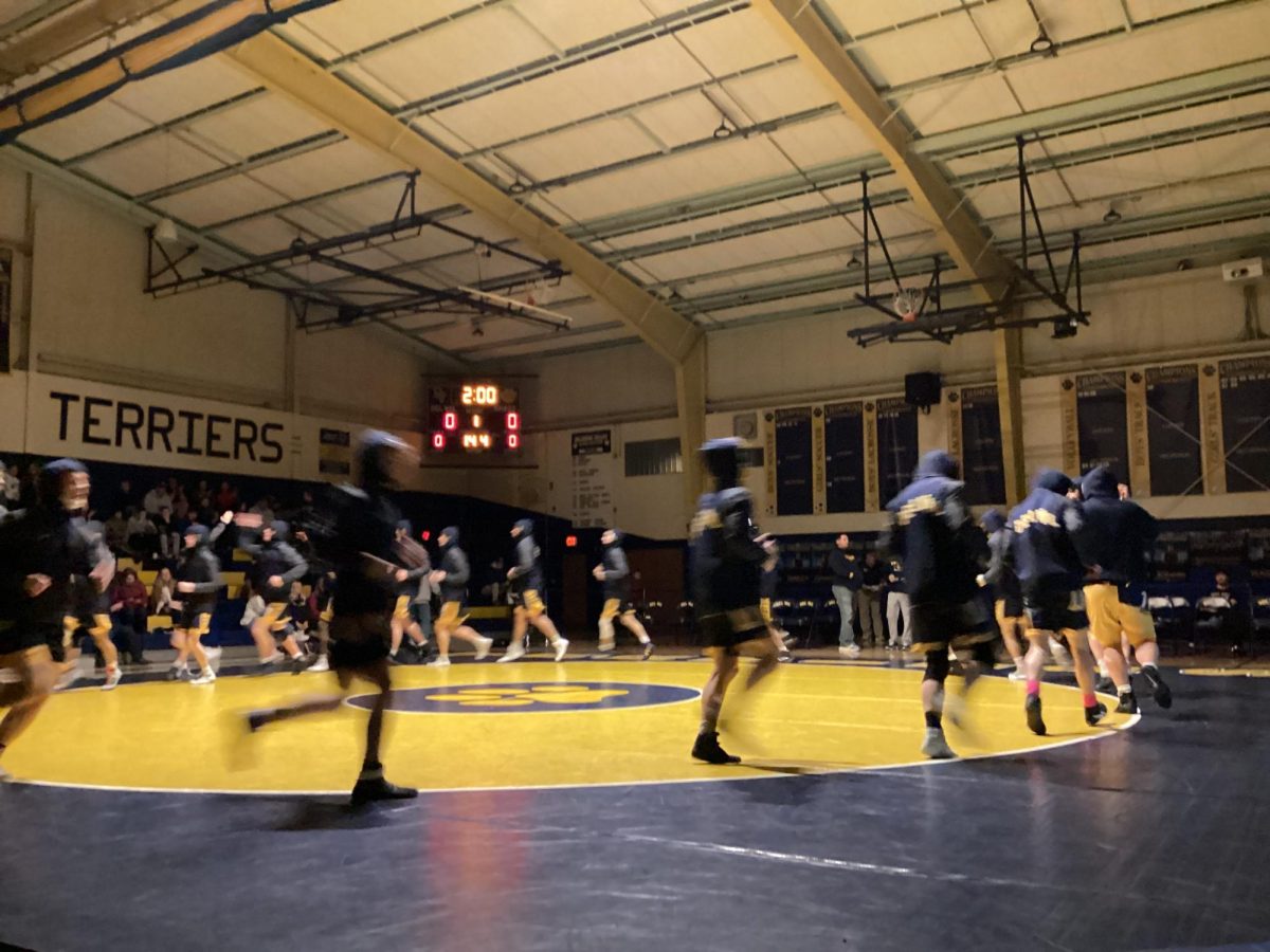 Del Val Terriers warm up before the match.