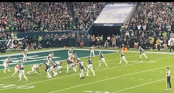 Saquon Barkley lines up next to Jalen Hurts against the falcons on a Monday night football game at Lincoln Financial field in Philadelphia 