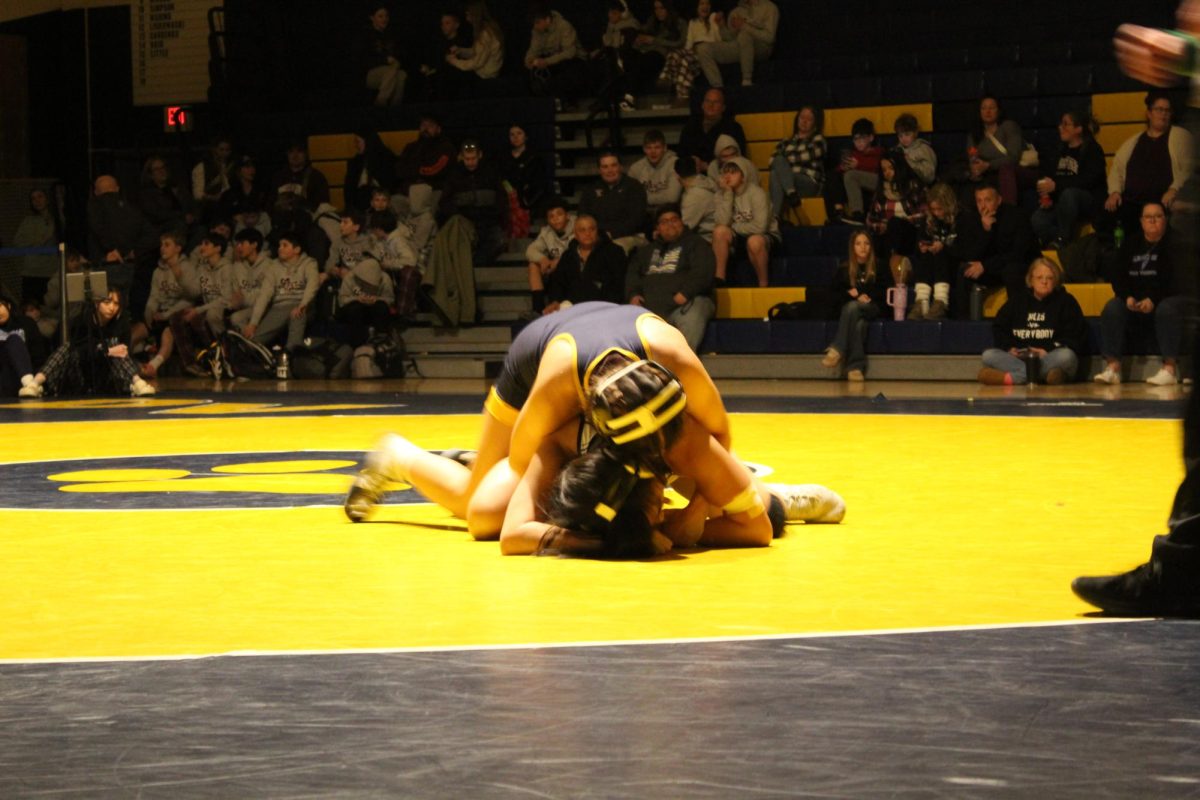 Freshman Wrestler Mia Renda, during her winning bout in the first girls home match at Del Val. 