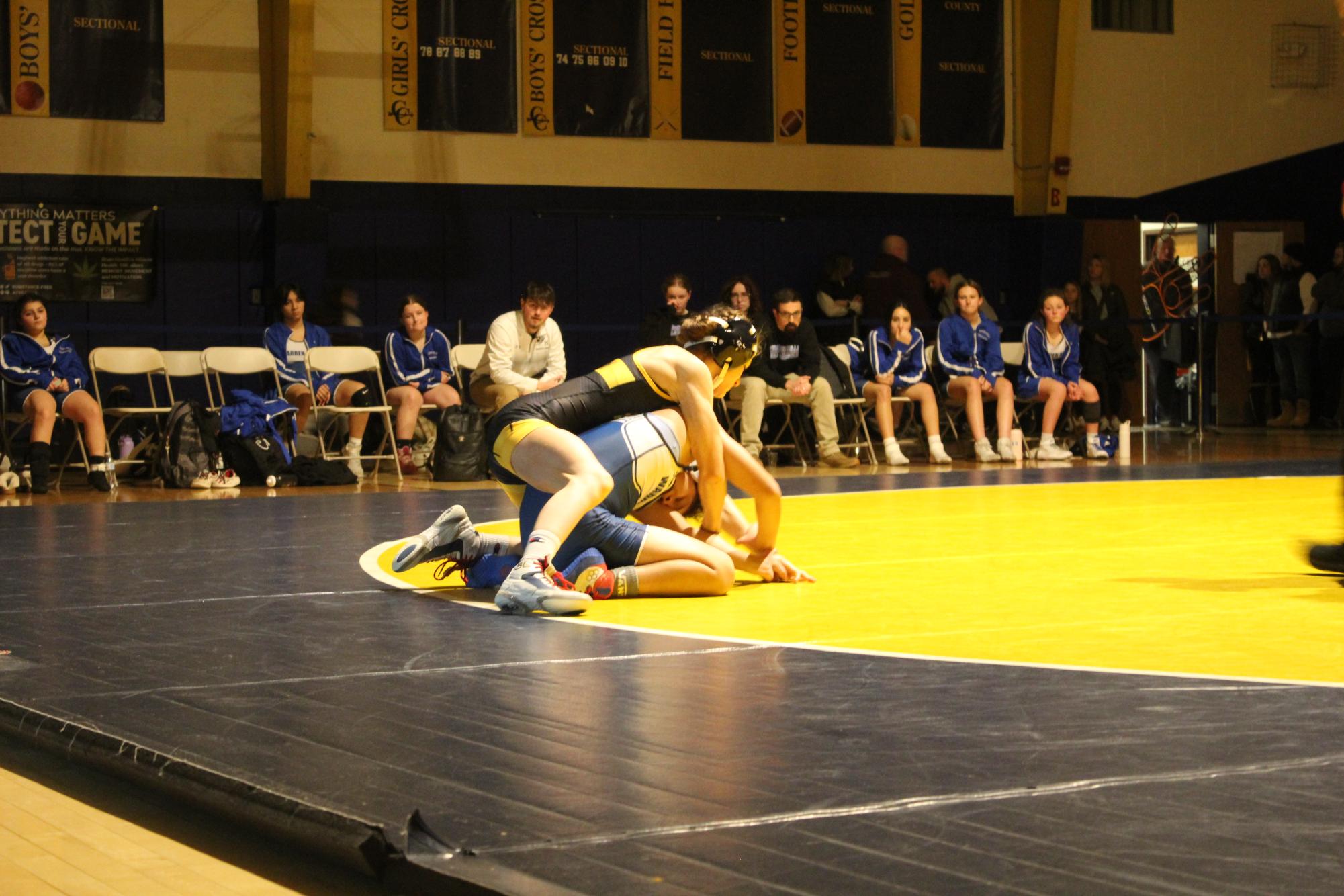 Del Val wrestler, Lydia Bagley, wrestling against Warren Hills in the first girls home match at Del Val. Bagley, a freshman, and 1 of 2 female participants, wrestled in Atlantic City, and placed 7.