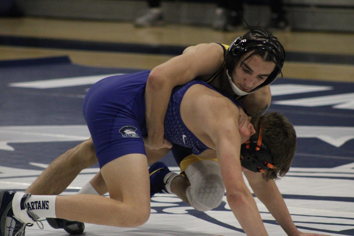 Del Val senior wrestler, Jaden Perez, wrestling against Immaculata. Perez was one of three Del Val wrestlers to place 7 in the Atlantic City Wrestling Finals.