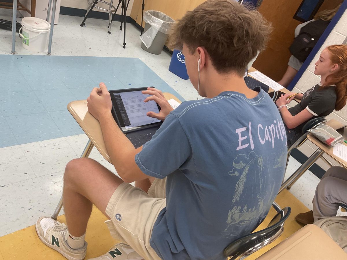 Del Val junior, Norbert Hirst, working on an article.