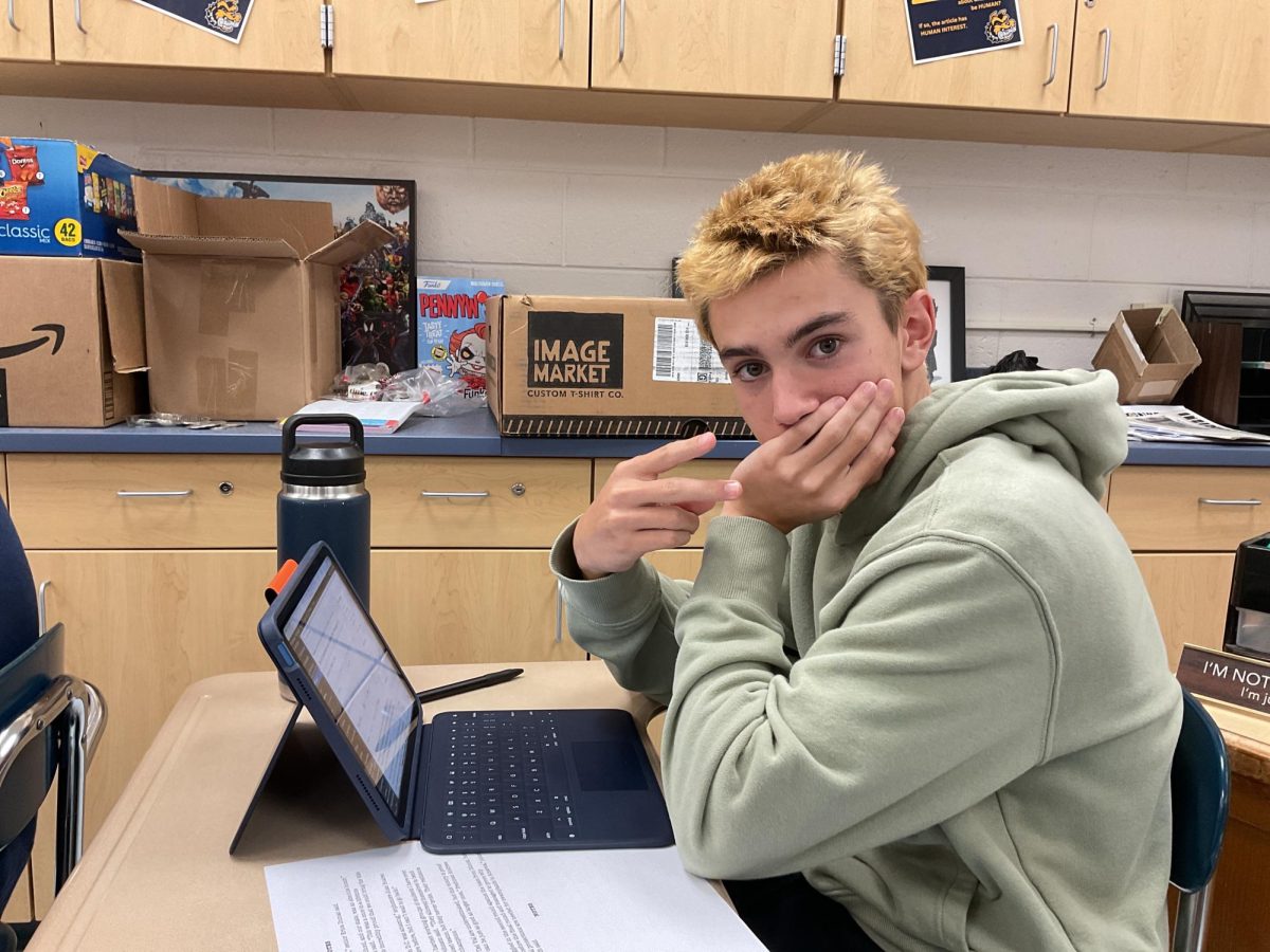 Freshman Grady Fransen taking his journalism final