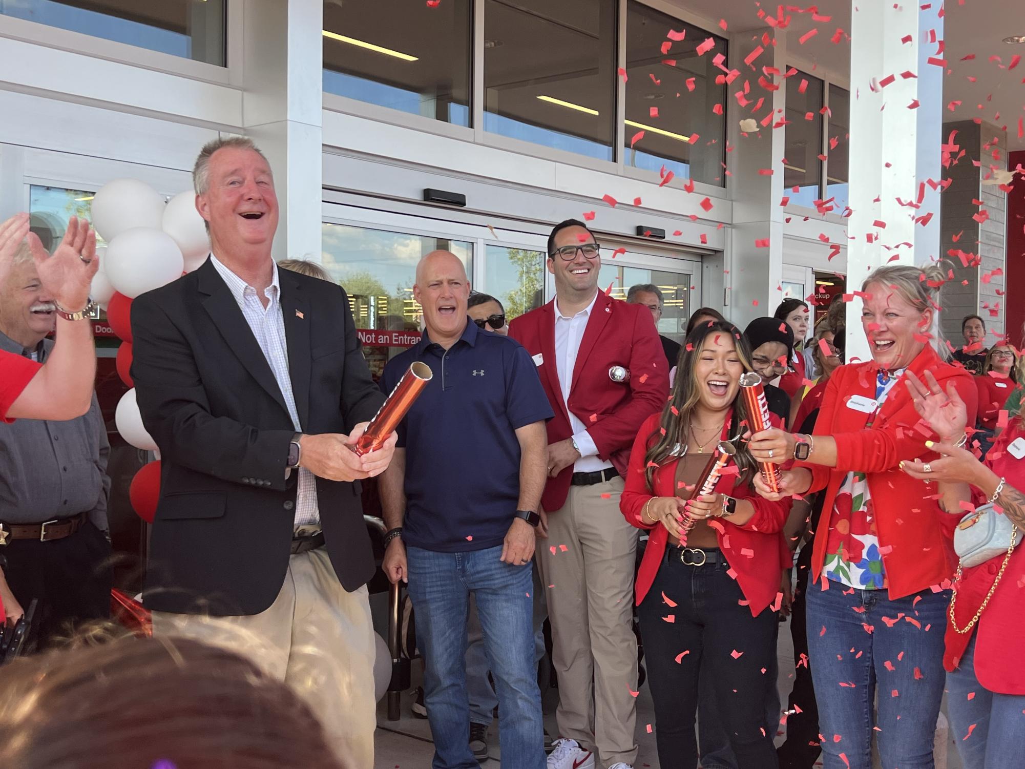 Bob King, the mayor of Raritan Township, fires a confetti popper to celebrate the soft opening. "I can't tell you how excited we are to see a Target opening up in our township," King said.