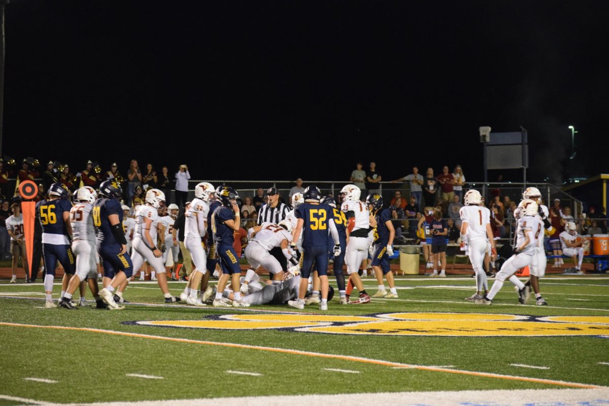 Del Val varsity football team deals with a rough tackle against Voorhees.