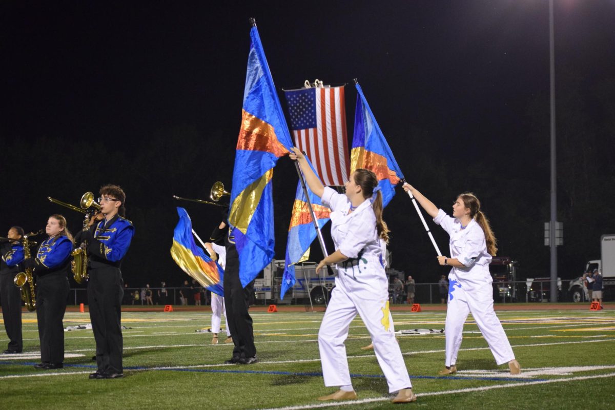 The Del Val color guard debuted their new uniforms for this week's halftime performance.