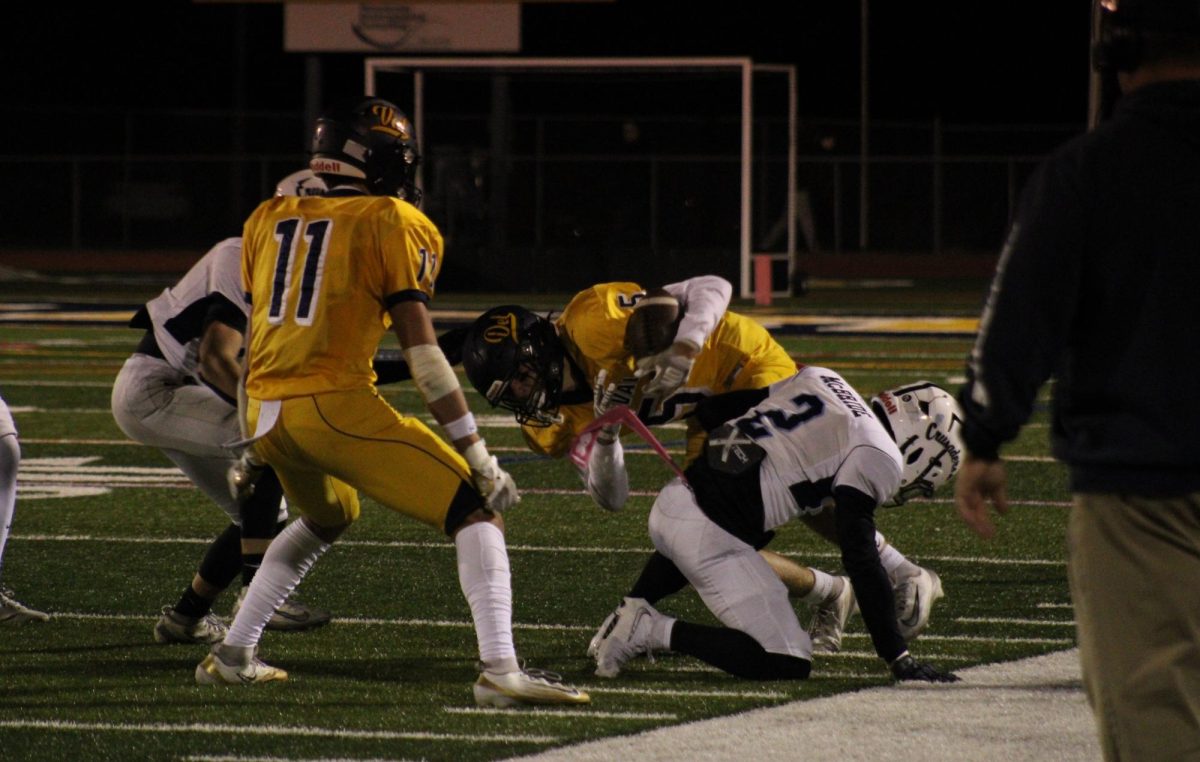 An A.L. Johnson player attempts to block a Del Val player from reaching the end zone. A.L. Johnson played hard defense the entire night.