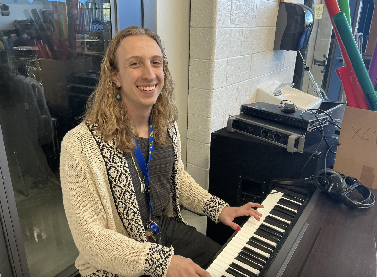 Andrew Chojinacki playing piano. As Del Val’s new choir teacher, they can’t wait to share and pass on his love for music to students.