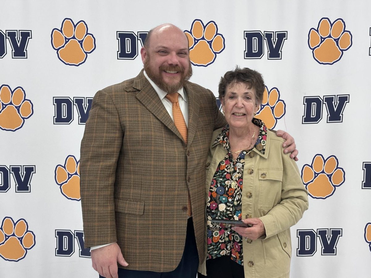 English teacher and theater director Jane Farmer smiles beside Kyle Tinnes. During her time with Del Val, she was an integral cog in the spring plays, directing them alongside Sheryl Keiper. Farmer tended to prefer comedies, which offered balance to the selections.