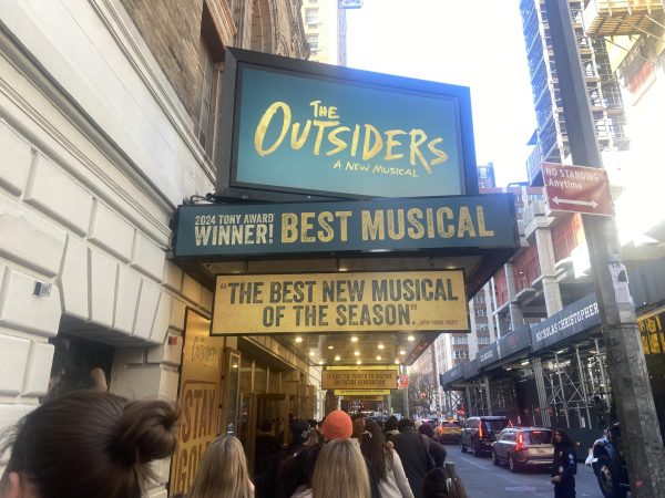 Del Val students wait impatiently by the stage doors of the Bernard B. Jacobs Theatre before the performance. "The Outsiders" won the Tony Award for best musical in 2024.