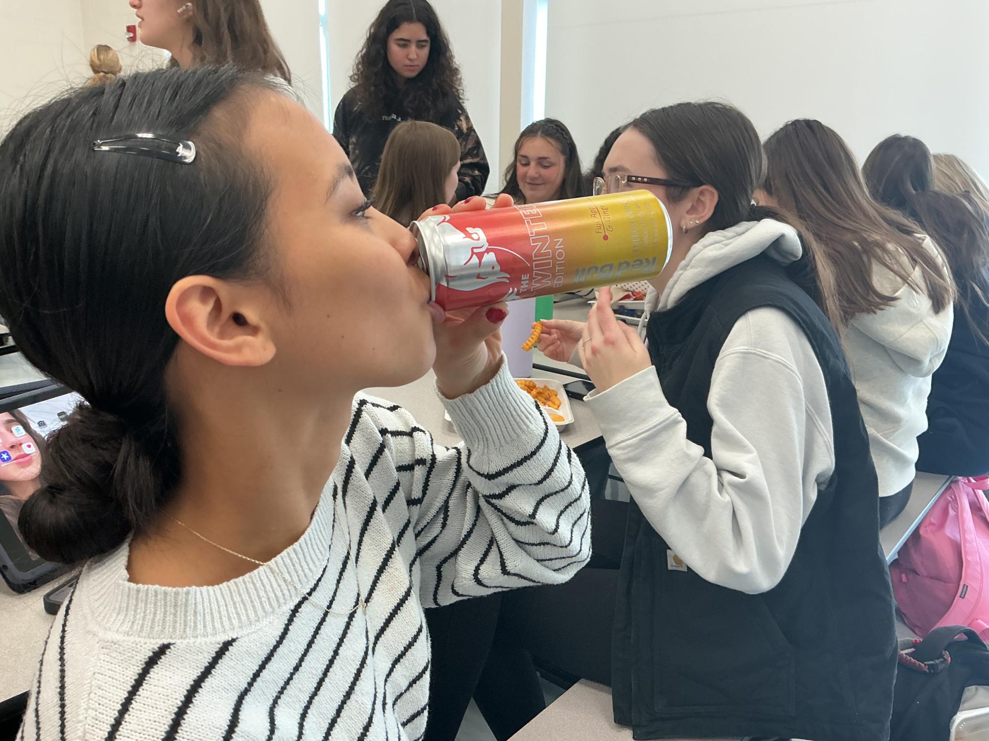 Senior Allysa Catalla drinks her favorite energy drink during lunch for a quick pick-me-up. Energy drink use has seen a distinct rise with teenagers in recent years.
