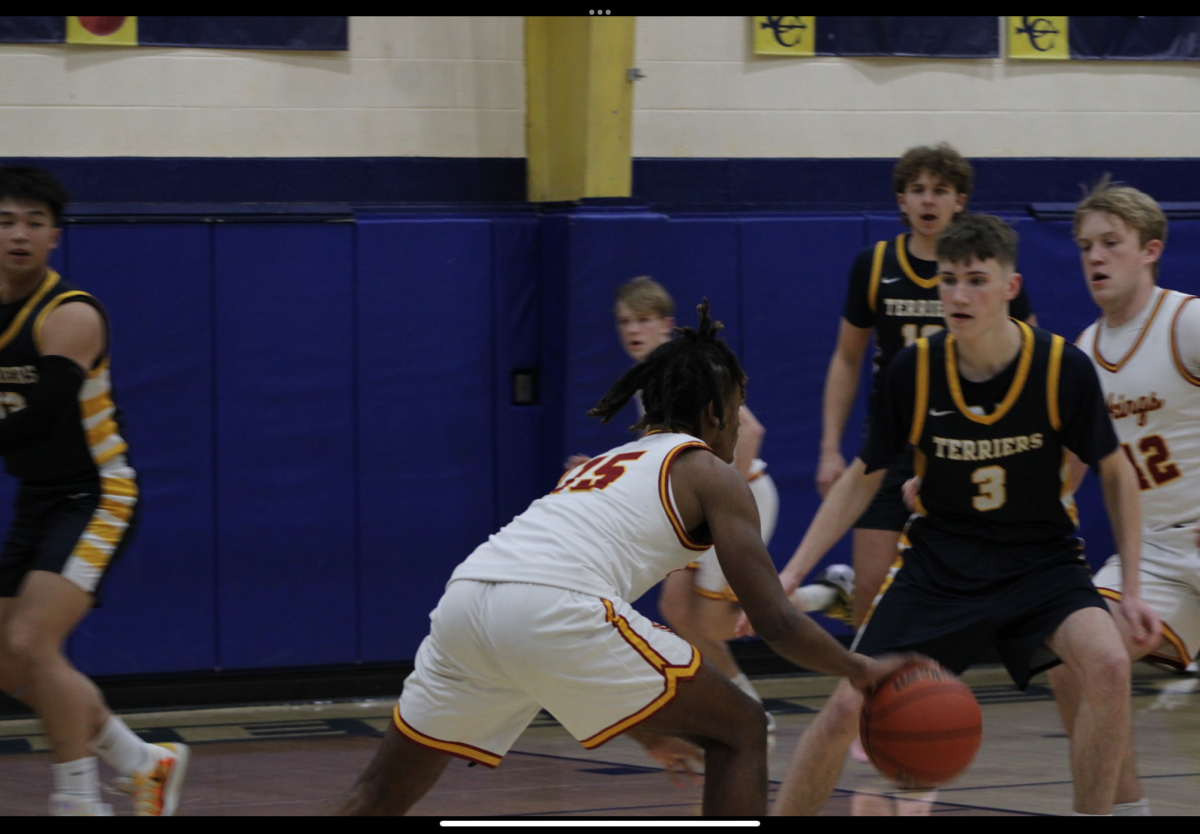 Pictured here are David Hudock, Terry Ni, and Tommy Denvir. They are guarding against a Voorhees player. They gave this game their all. 
