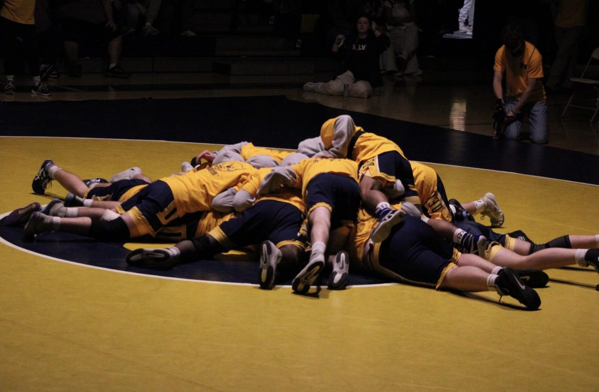 The pre-match dog pile sets the tone before every wrestling match. Del Val went on to defeat local rival Hunterdon Central at the 19th annual Gold Rush.
