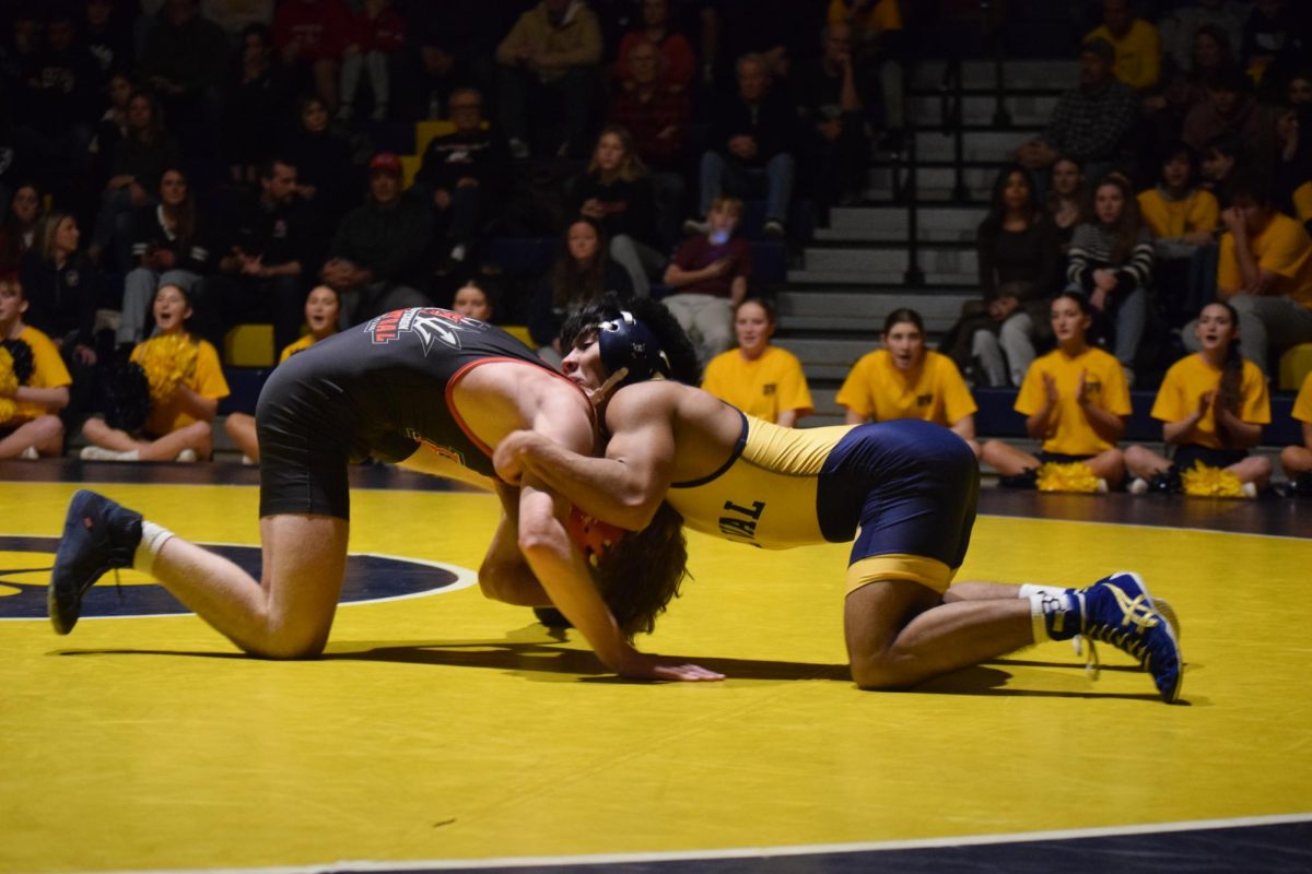Senior Julian Bednar defeats Hunterdon Central's Brandon Voll by technical fall. Bednar was one of 11 Del Val wrestlers to win during the Gold Rush.