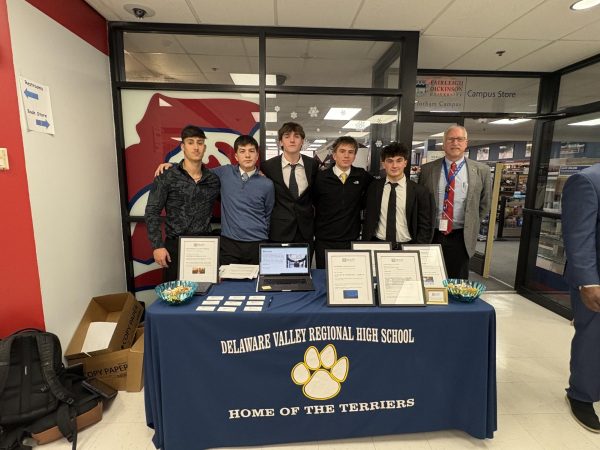 Del Val Business Academy students, seniors Jake Cooke, Marco Nassi and Tyler Scherer; and juniors Oscar Arrieta and Adrian Poloskei, representing the program’s business at the Virtual Enterprises' Central NJ Business Plan Competition and Trade Show at Fairleigh Dickinson University. (Photo via Joseph Perricone)