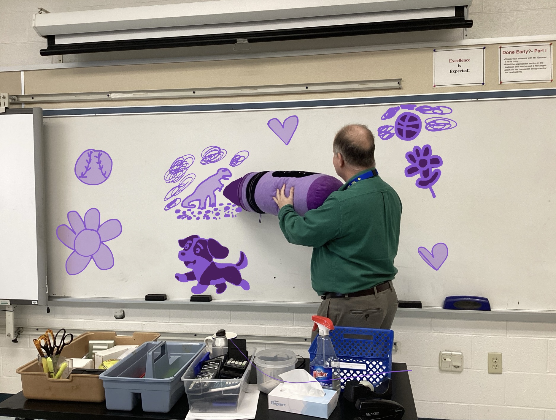 Physics teacher James Gessner doodles with his jumbo purple crayon before the school day begins.