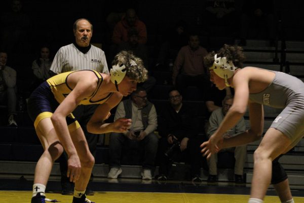 Tanner Donaruma wrestling Dante Glynos. Donaruma wins the bout by decision, bringing the score to 53-13 Del Val.