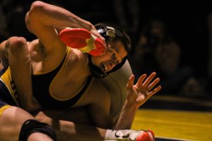 Del Val's Michael Hasson wrestles Manville's Anthony Monge. Hasson won by major decision, bringing the score to 34-21 Del Val with two bouts remaining.