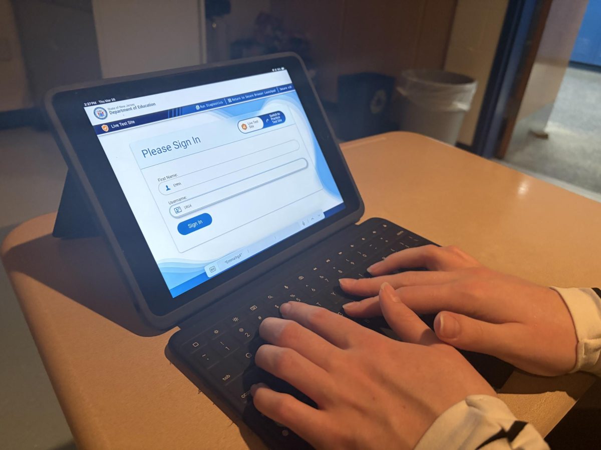 Junior Emma Haig enters the Cambium Assessment app, a new testing platform introduced this year. Following confusing regarding the instructions of the NJGPA, juniors have been granted an opportunity to retake the English portion of the assessment.