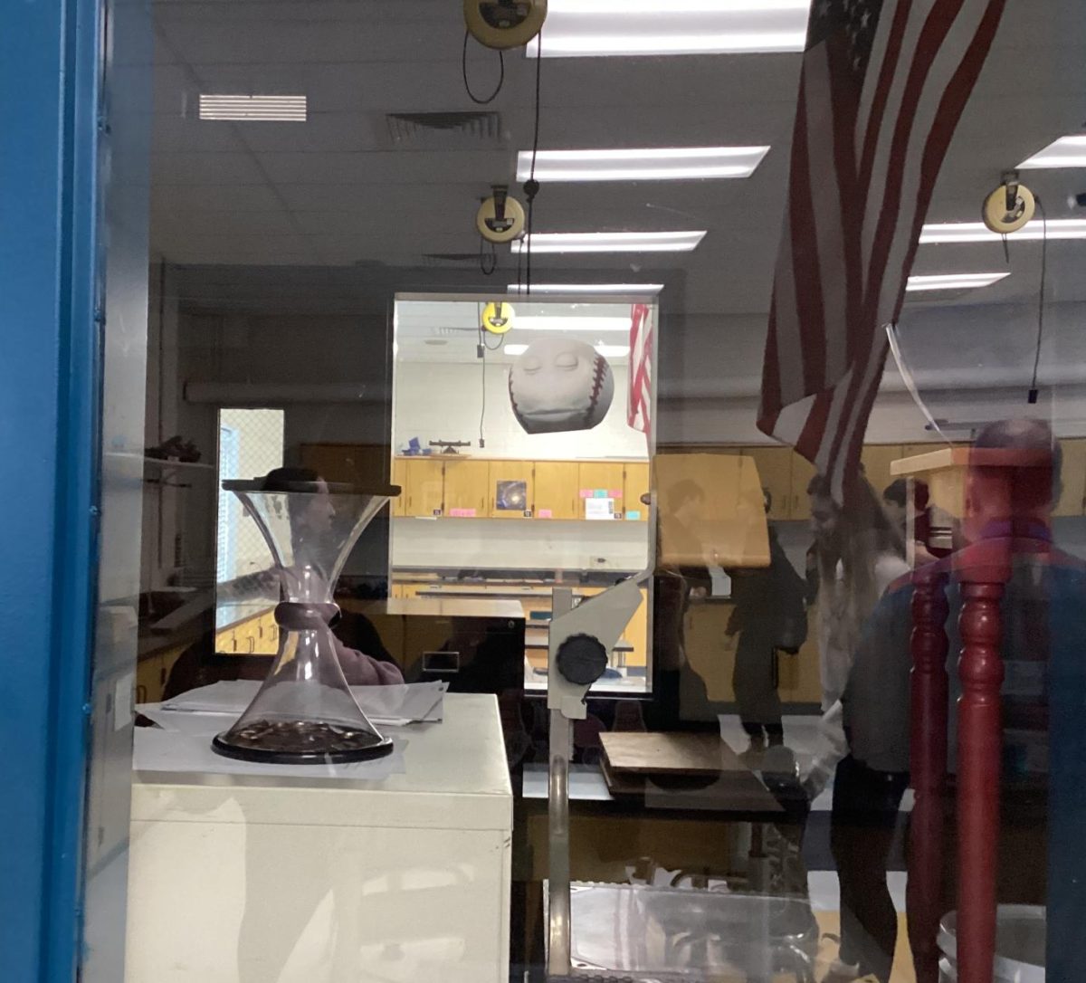 A baseball that located in Mr. Gessner’s room, taped to the lab window  