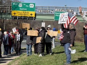 Protesters gather in Phillipsburg, New Jersey to protest No Kings. Around 10:00 in the morning, protesters arrived and spent one hour advocating for No Kings. 