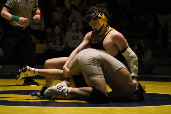 Senior Jacob Edwards defeats Manville wrestler Valentino Velando by major decision in the Group 1 Sectional finals. Del Val's win over Manville left them the only undefeated public school in the state.