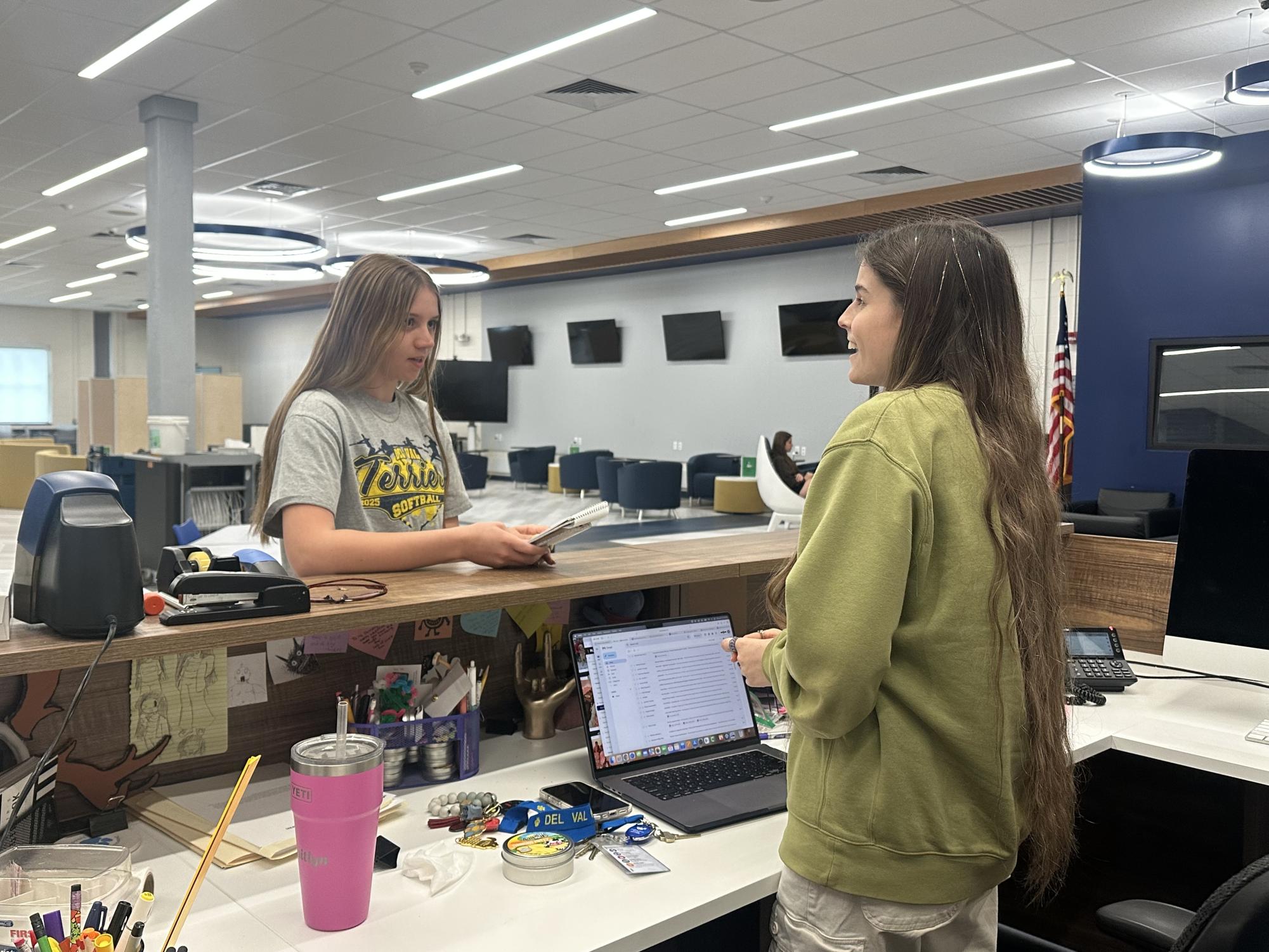 Editor Ellie Lyons interviews paraprofessional Kaitlyn Donnelly for an upcoming story. Without New Voices, students are not as protected to tell these important stories.