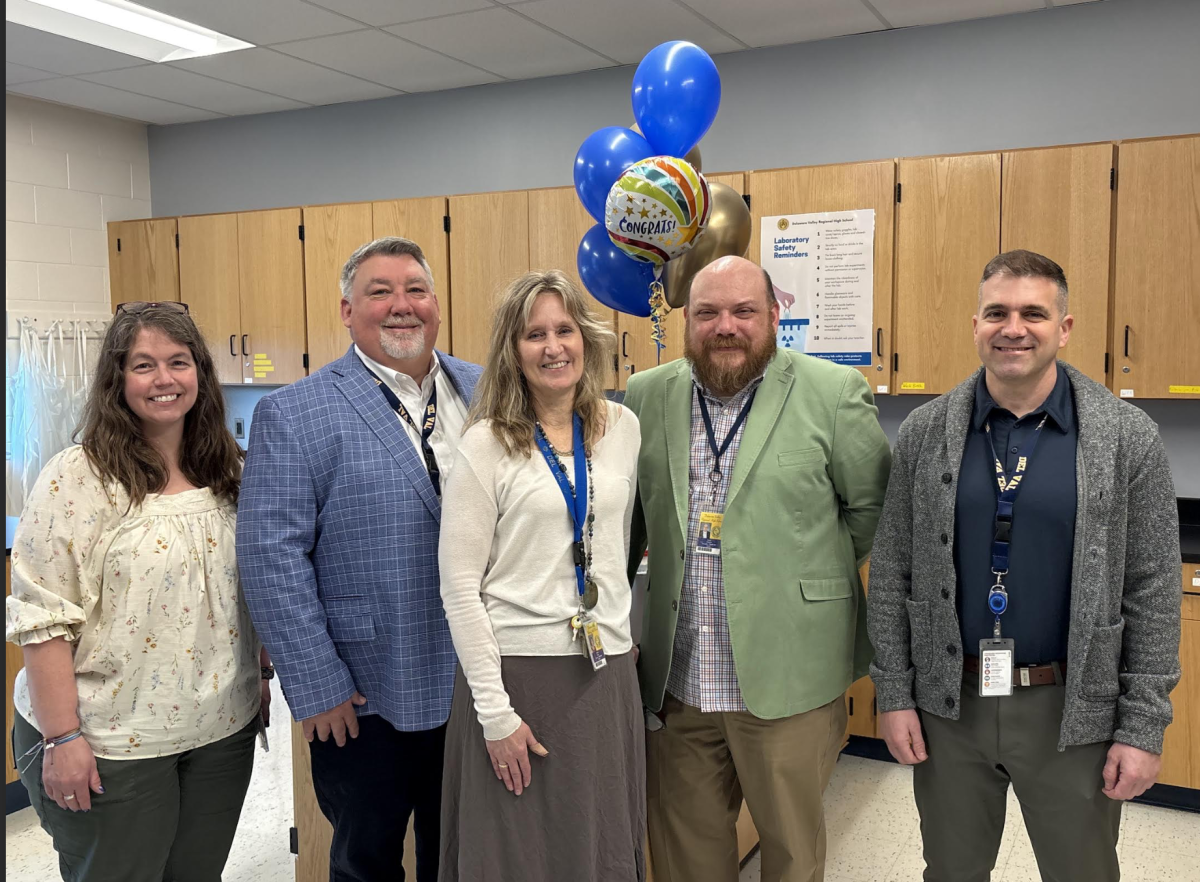 Caryn Bowe, standing with Science Supervisor Stacy Grady, Superintedent Scott McKinney, Performing Arts Supervisor Kyle Tinnes and Principal Michael Kays in her classroom. After receiving numerous nominations, Bowe was selected as the 2026 Delaware Valley High School Educator of the Year. 