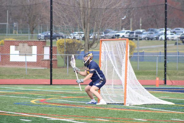Luke Cyphert blocking a shot on goal. Cyphert is a four year varsity lacrosse player with over 500 saves in his career. Along with playing lacrosse, Cyphert is a two year varsity wrestler.